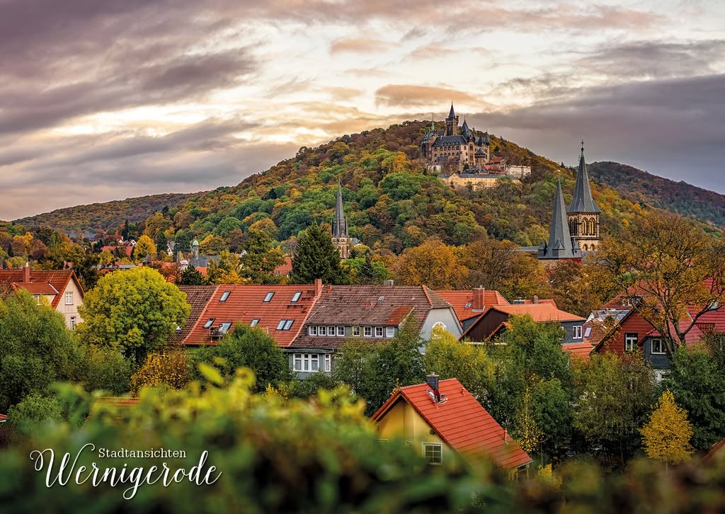 Wernigerode Castle above the autumn old town under a dramatic sky Wernigerode Castle above the autumn old town under a dramatic sky