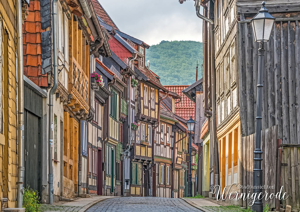 Narrow lane with half-timbered houses in Wernigerode Narrow lane with half-timbered houses in Wernigerode
